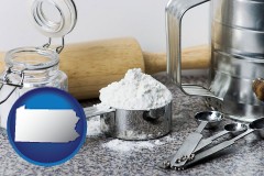 pennsylvania map icon and baking equipment, flour, and salt